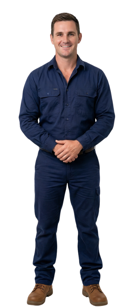 Man in blue workwear standing and smiling